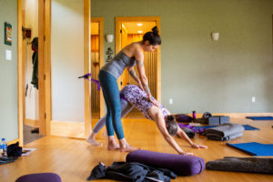 Alix assisting a student