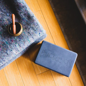 yoga clock, blanket and meditation bowl